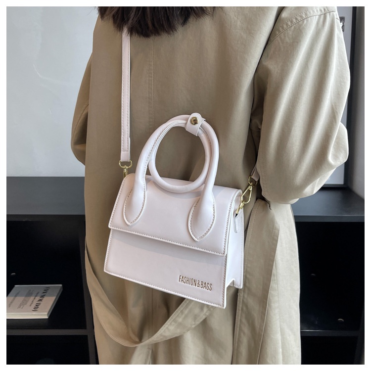 Túi xách nữ cầm tay đeo chéo đeo vai thời thượng quai xoắn có nút bấm LK297