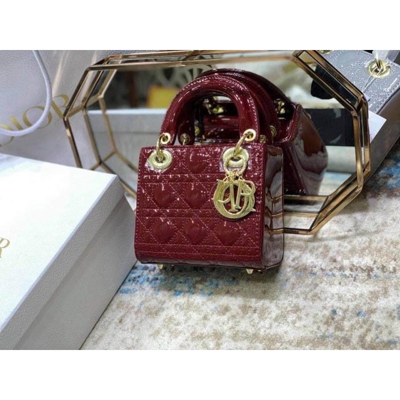 Túi da bóng khoá vàng mini