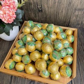 Trà Phổ Nhĩ Quýt nhãn xanh, một sản phẩm của trà phổ nhĩ quýt Tân hội thơm ngon phẳng phất mùi quýt vô cùng dễ chịu
