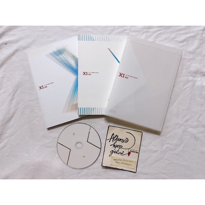 X1 mini album Quantium leap đã khui seal, gồm cd photobook như hình.