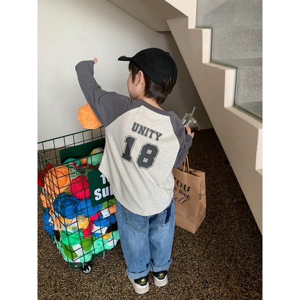 Quần bò túi rách bé trai