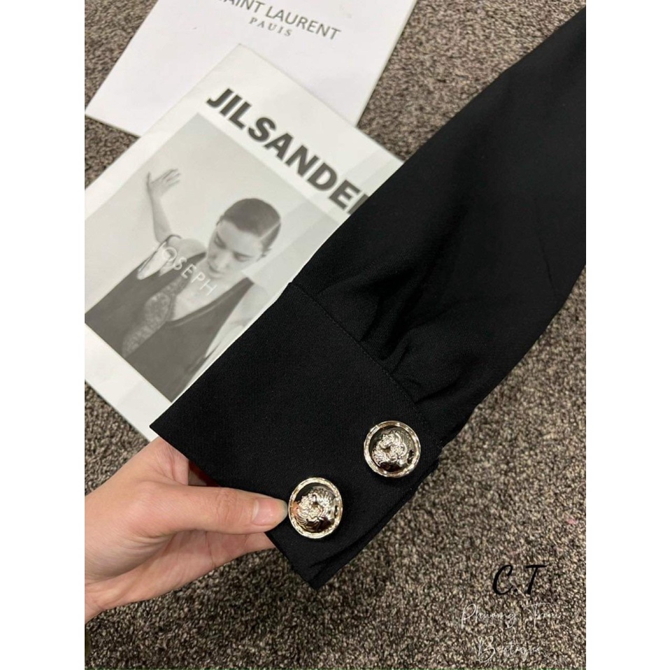 Áo vest tuyết mưa phối khuy siêu sang