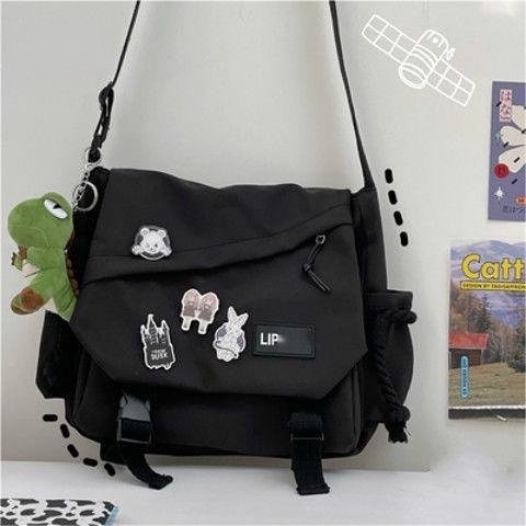 🔥Sẵn sàng giao hàng🔥Phiên bản Hàn Quốc Túi nữ dung tích lớn Túi nylon đeo vai Harajuku Túi Messenger thông thường