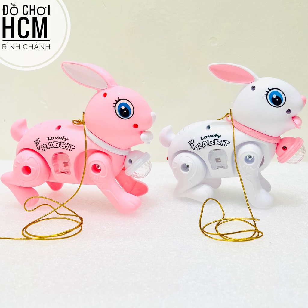 Đồ chơi giải trí thỏ pin có đèn nhạc kèm dây cho bé dắt đi dạo dành cho bé yêu thích động vật, thỏ con