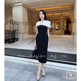 Đầm dáng chữ A phối tay đính khuy đá