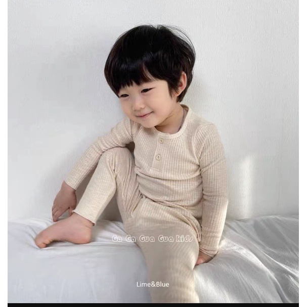 Bộ dài tay tăm cúc mềm dày cho bé