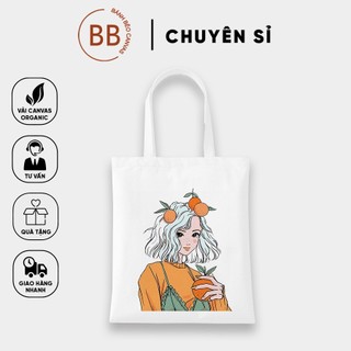 Túi tote canvas đeo vai cô gái cầm quả cam có khóa và túi con