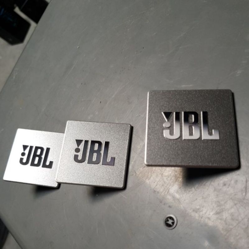 Một cái Logo JBL chính hãng, KT 5cm*5cm*2mm