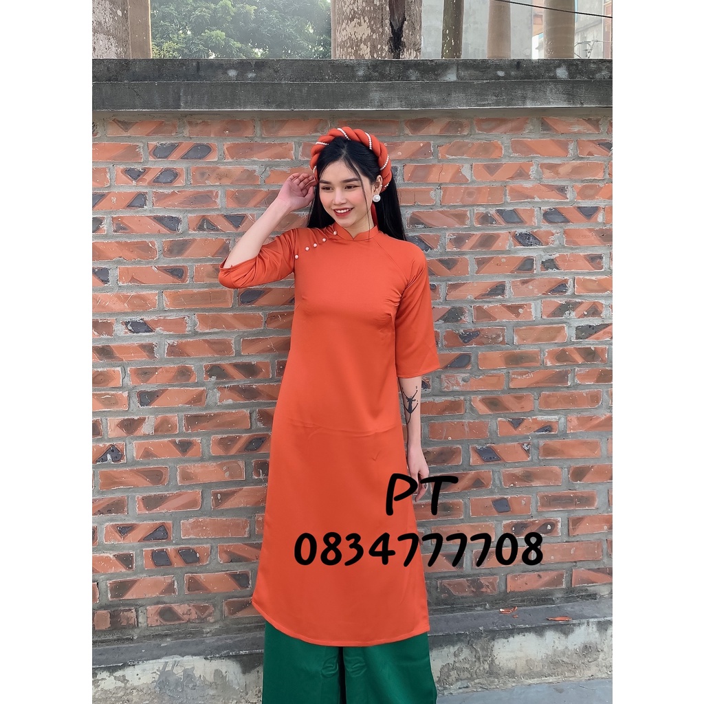 Áo dài nữ cách tân màu cam tây trơn sang trọng, quý phái kèm mấn xinh