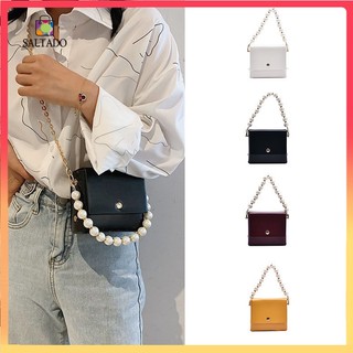 Túi mini đeo vai phối chuỗi ngọc trai và chuỗi xích thời trang