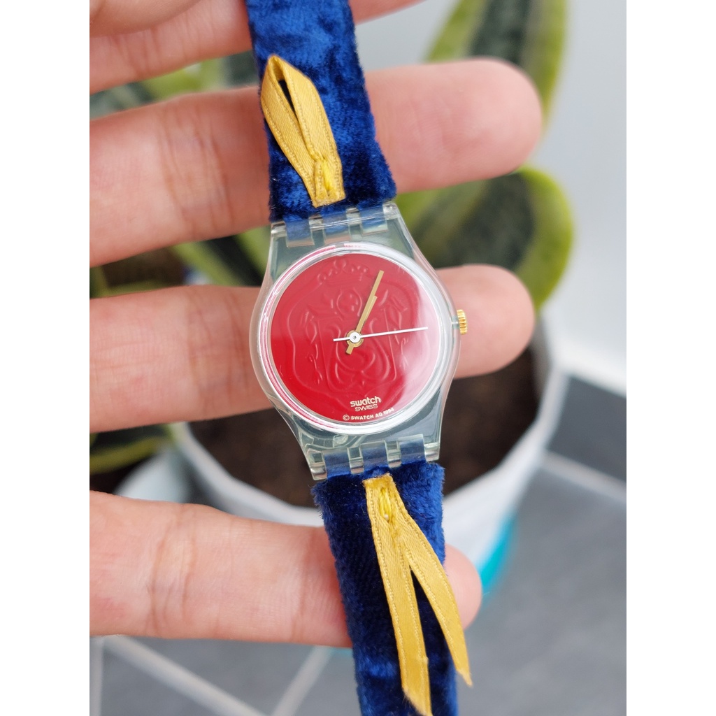 Đồng hồ Thuỵ Sĩ nữ Swatch mặt đỏ chạy pin hàng Si