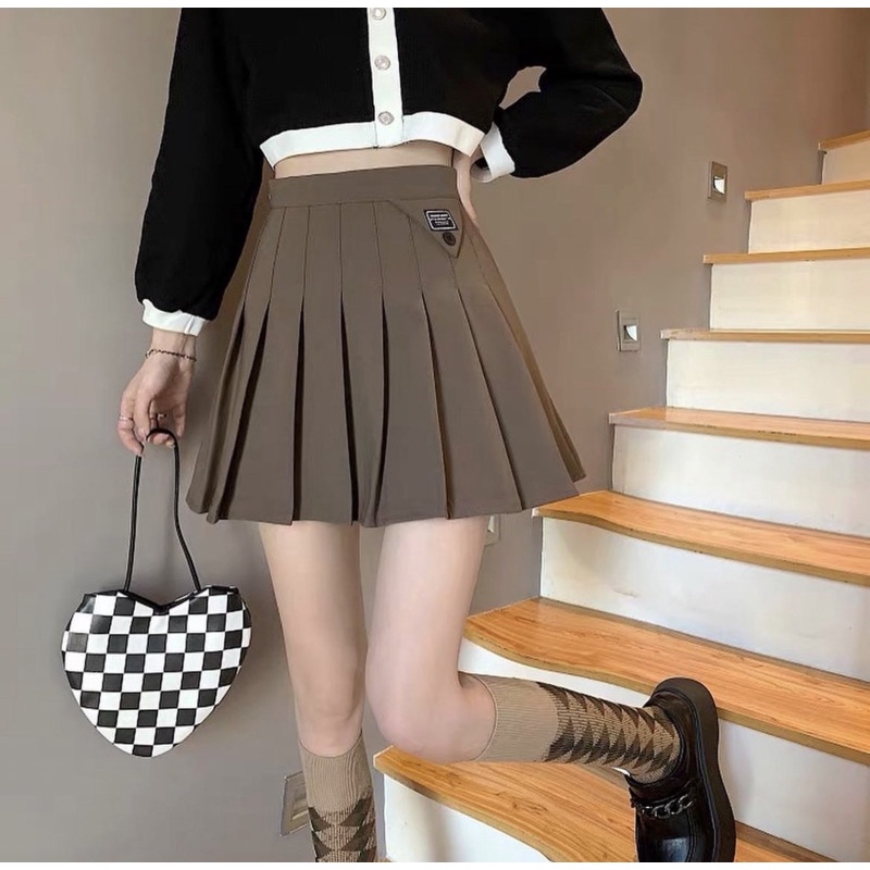 Chân váy xếp ly màu be
