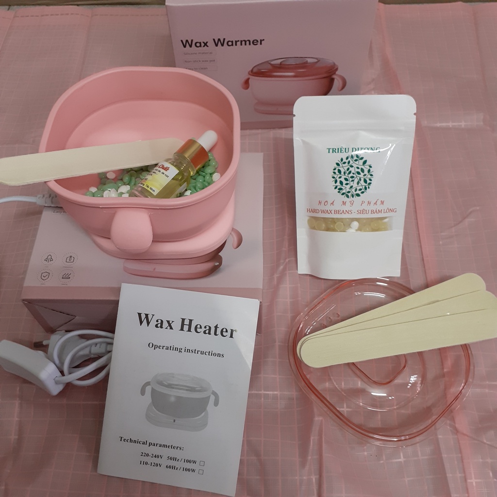 1 nồi nấu sáp wax lông silicon bỏ túi + sáp 50g màu Triêu Dương + Mỡ trăn 10ml. Tặng que wax