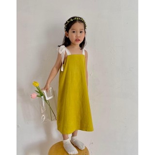 Đầm thiết kế cột nơ cho bé