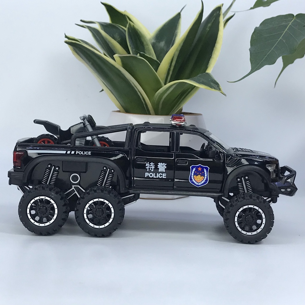 Mô hình xe cảnh sát Ford F150 Raptor 6x6 tỷ lệ 1:28 bằng kim loại có đèn chớp ưu tiên và còi hú chuyên dụng