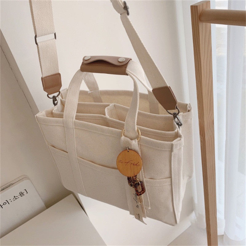 Hàn Quốc ins Mommy Bag Canvas Mommy Bag Thời trang đa chức năng Mother&Baby Single Shoulder Slant Bag Túi vải Tote Túi vải cho trẻ sơ sinh Túi mẹ đa chức năng Túi mẹ công suất lớn