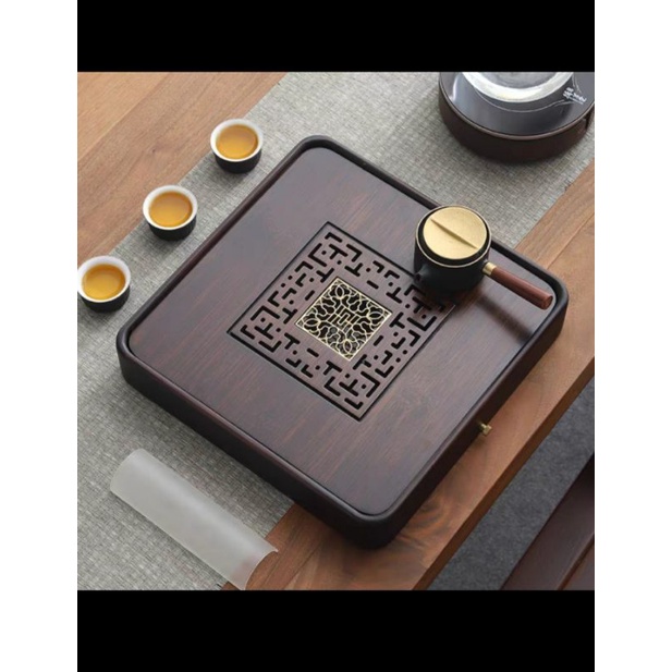 khay chữ nhật được làm từ gỗ nguyên khối đế nhựa cao cấp mặt để ấm bằng đồng rất đẹp