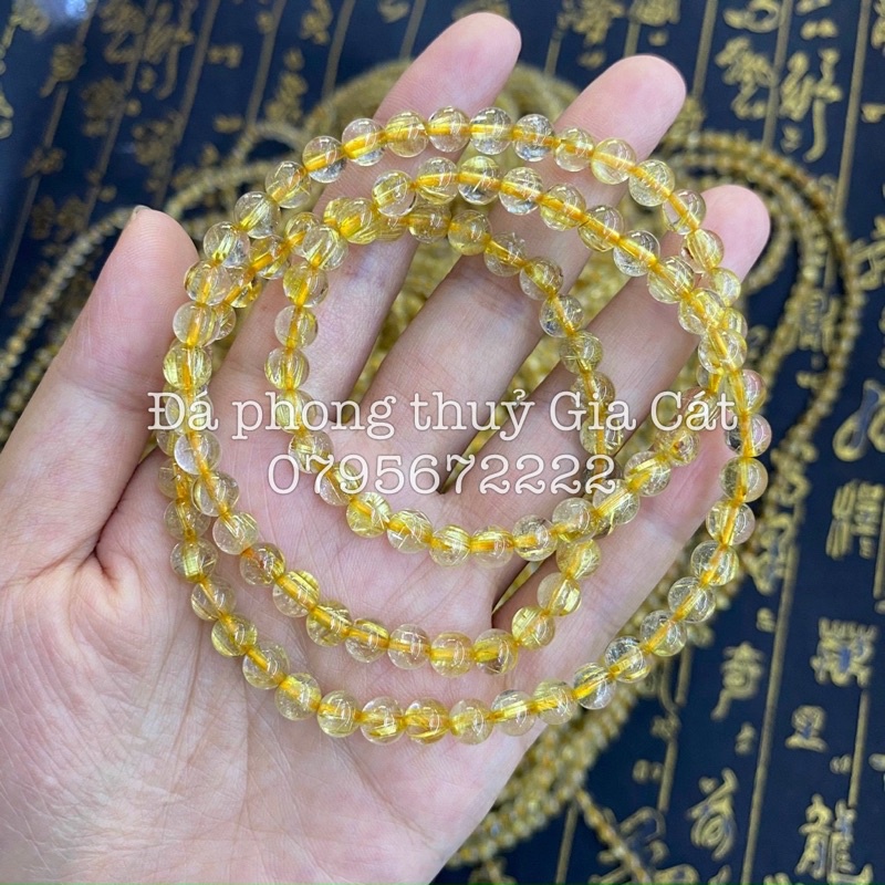 Vòng tay đá thach anh tóc vàng quấn có kiểm định