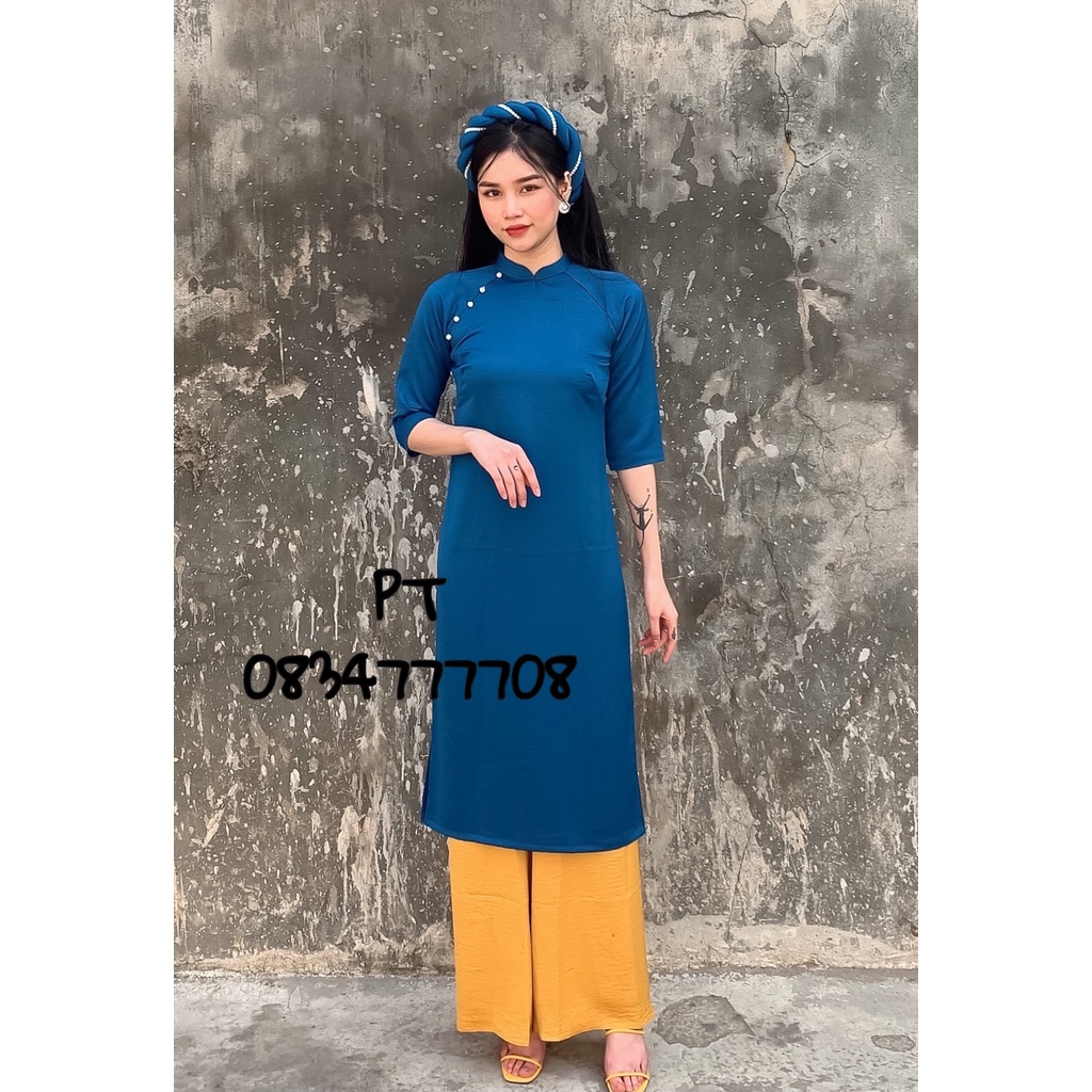 Áo dài nữ cách tân màu xanh trơn kèm mấn xinh cho các chị em