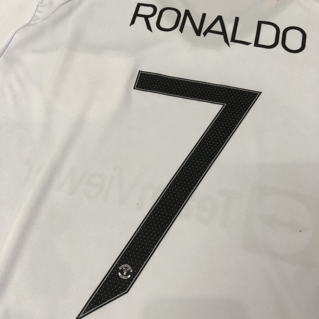 Bộ quần áo đá banh MU trắng in tên RONALDO font đấu cup