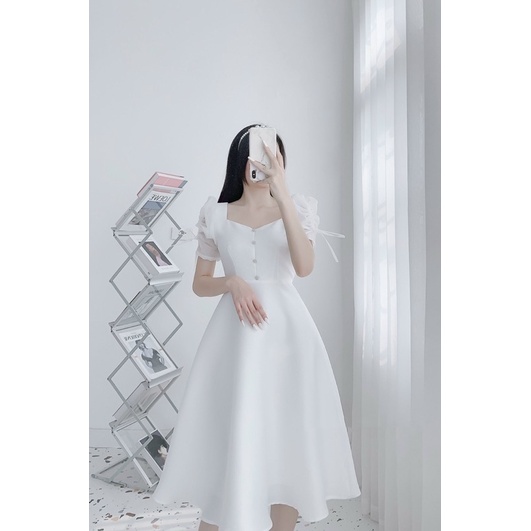 Váy rút tay cúc xoè trắng