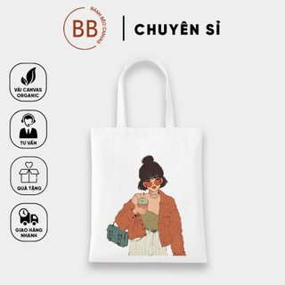 Túi tote vuông vải canvas đeo ngang vai cô gái