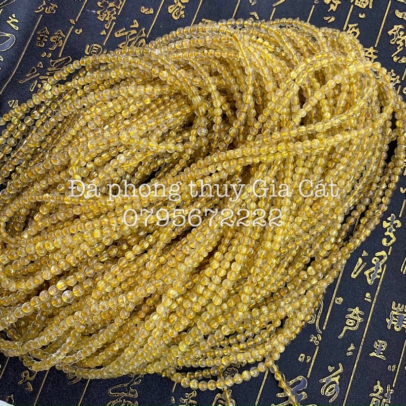 Vòng tay đá thach anh tóc vàng quấn có kiểm định