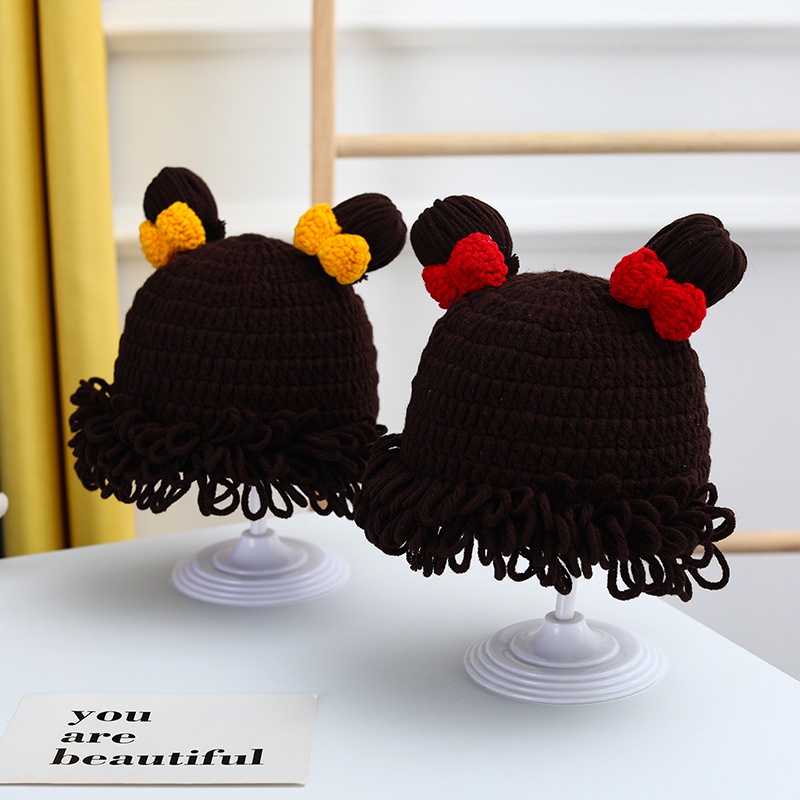 Mũ Len Trùm Đầu Đính Nơ Và Tóc Giả Cho Bé