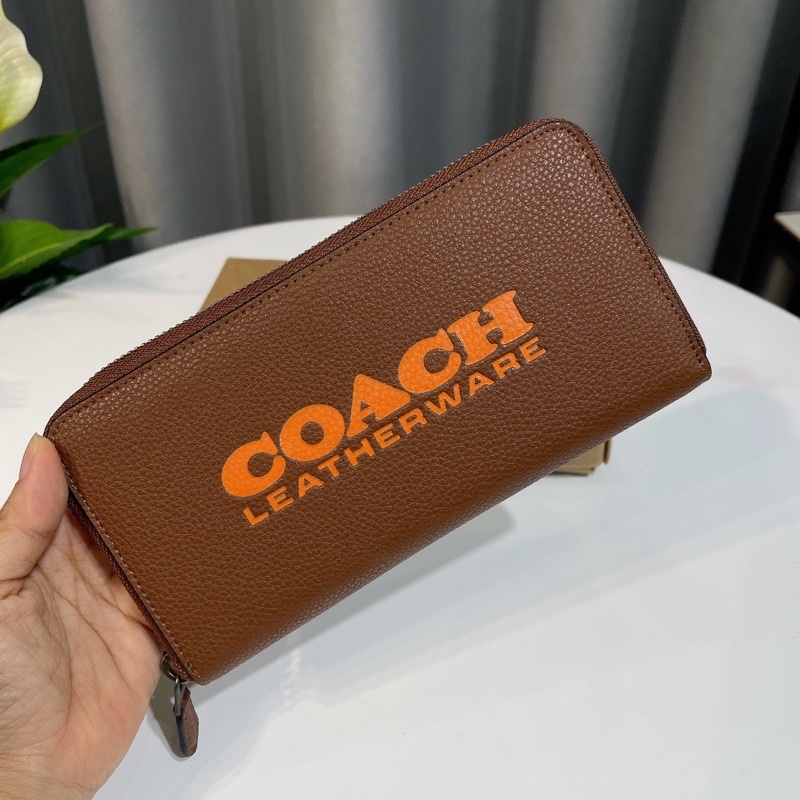 Ví cầm tay dài CO**ACH da thật