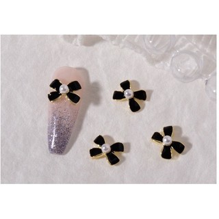charm nơ trắng đen nail