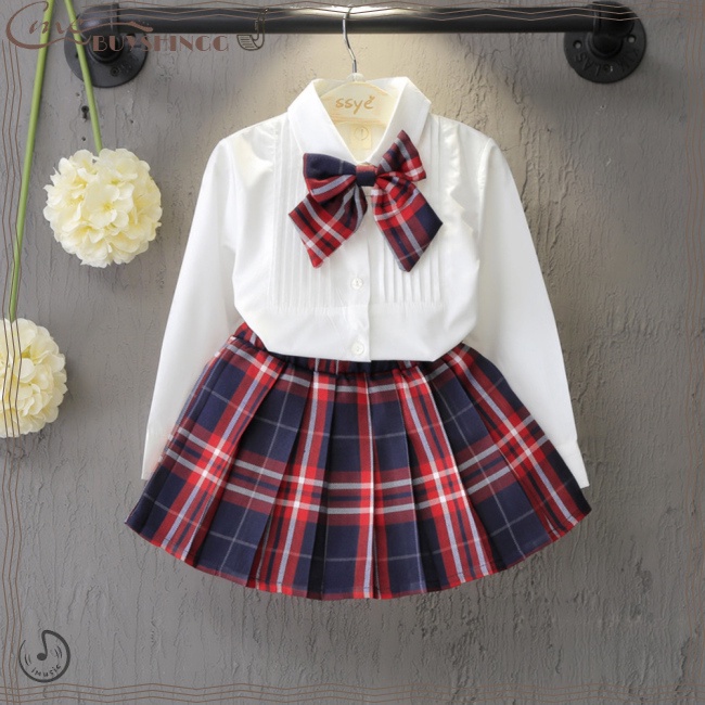Set Đồ 2 Món Gồm Áo Sơ Mi Cotton Tay Dài Thắt Nơ Cổ + Chân Váy Xếp Ly Kẻ Sọc Caro Lưng Thun Cho Nữ