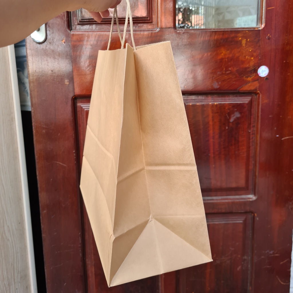 Thanh Lý - Túi giấy Kraft đã in logo 1 mặt, giấy dày, quai chắc chắn