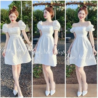 Đầm gấm màu trắng có mút tay phồng dáng mini xòe , màu trắng thanh lịch tao nhã mặc dự tiệc cực sang