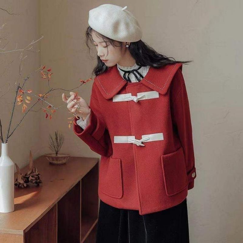 Áo khoác nỉ mỏng hai cúc cài khuy gỗ dáng ngắn