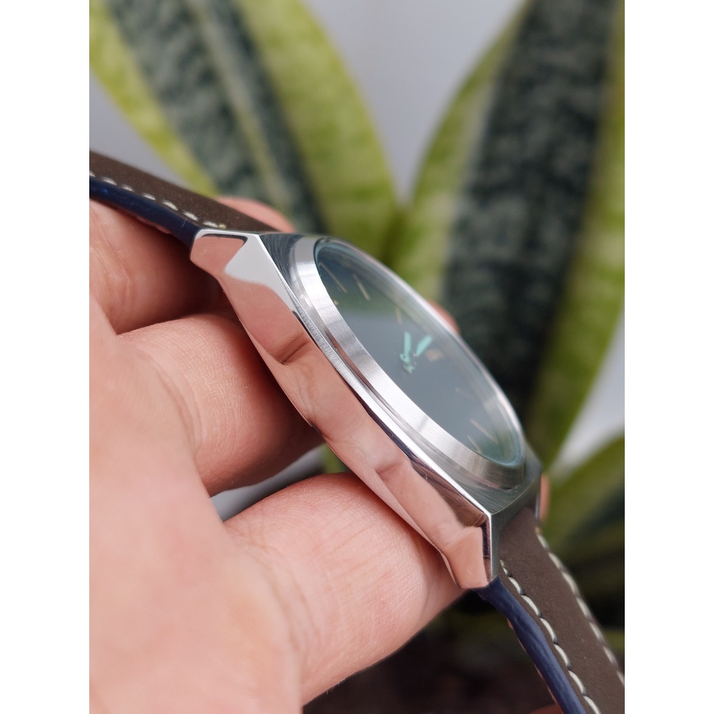 Đồng hồ nam Nixon mặt xanh chạy pin hàng Si