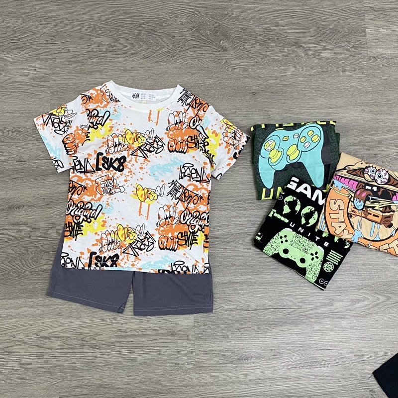 Bộ cộc tay cho bé trai in hình dòng đại size từ 22-48 cân