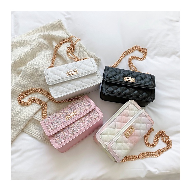 Túi ô trám khoá hoa xoay hàng quảng châu