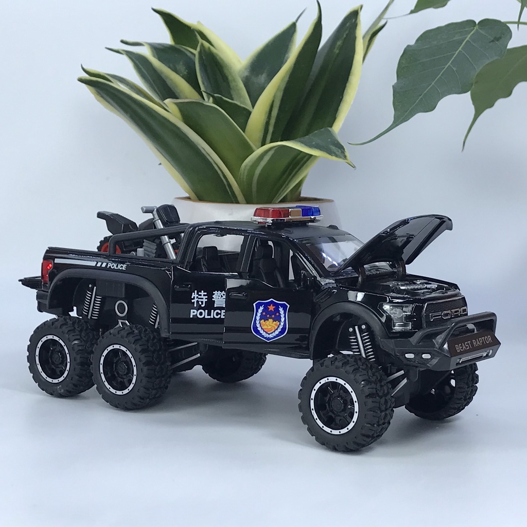 Mô hình xe cảnh sát Ford F150 Raptor 6x6 tỷ lệ 1:28 bằng kim loại có đèn chớp ưu tiên và còi hú chuyên dụng