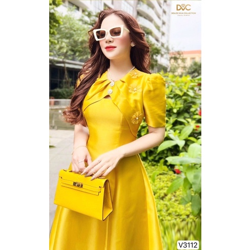 V3112 váy xoè màu vàng dính hoa