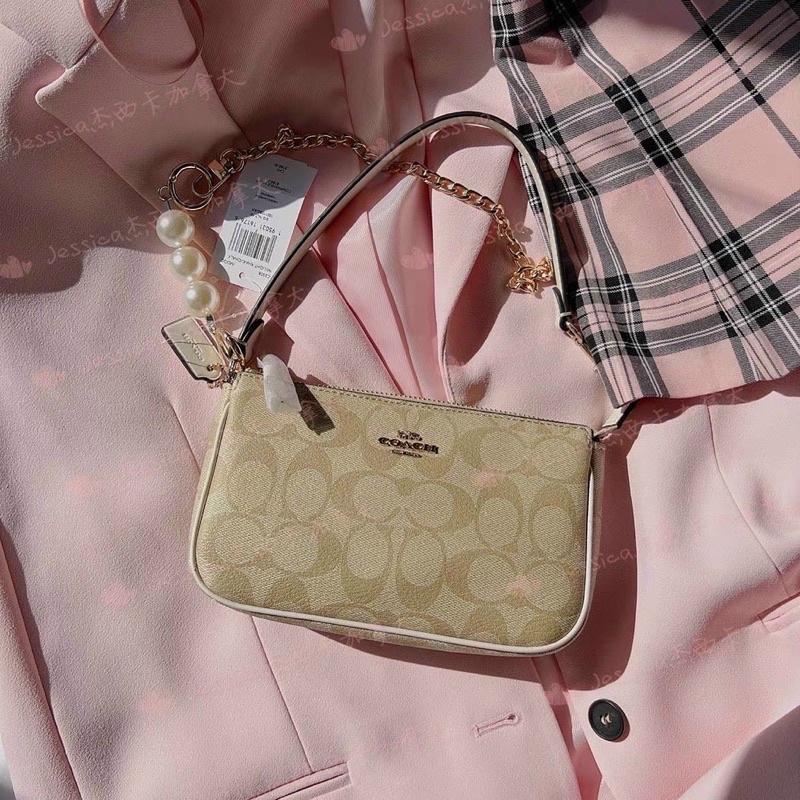 Túi kẹp nách Coach mini