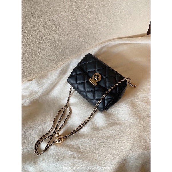 Túi 𝐌𝐢𝐨𝐜𝐫𝐚 𝐊𝐨𝐥𝐲 khóa hoa trà da mềm