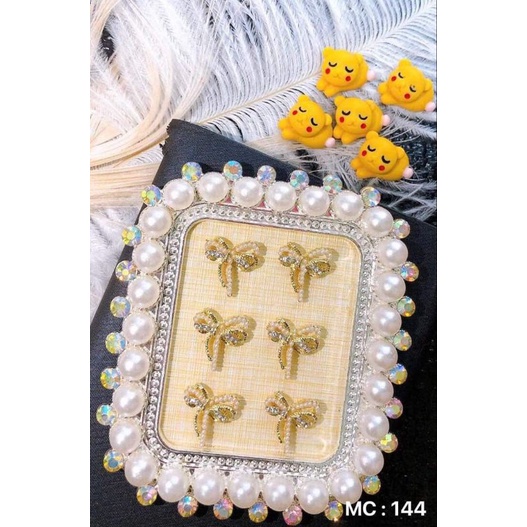charm nơ ngọc trang trí móng