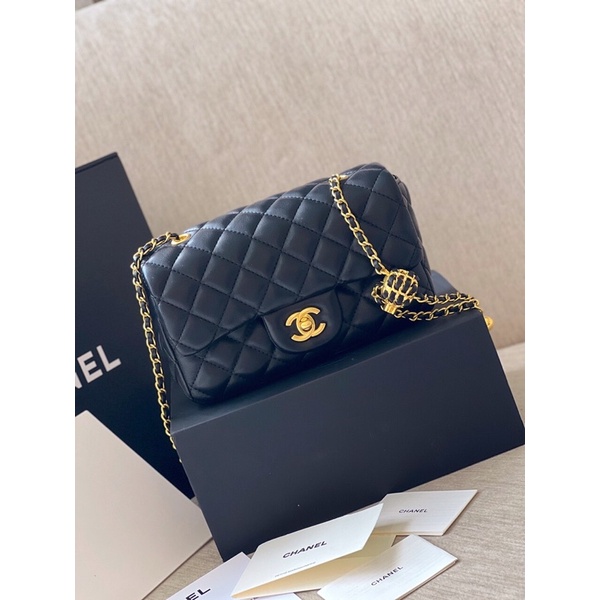 Túi nữ chà leo dây xích pha da quả chuông