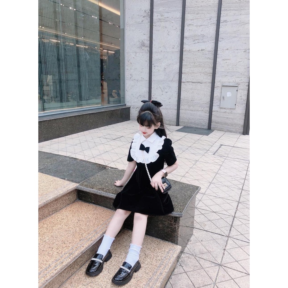 BÁN SỈ VÁY NHUNG ĐEN BÉ GÁI CỔ SƠ MI TRẮNG BÈO NƠ ĐEN