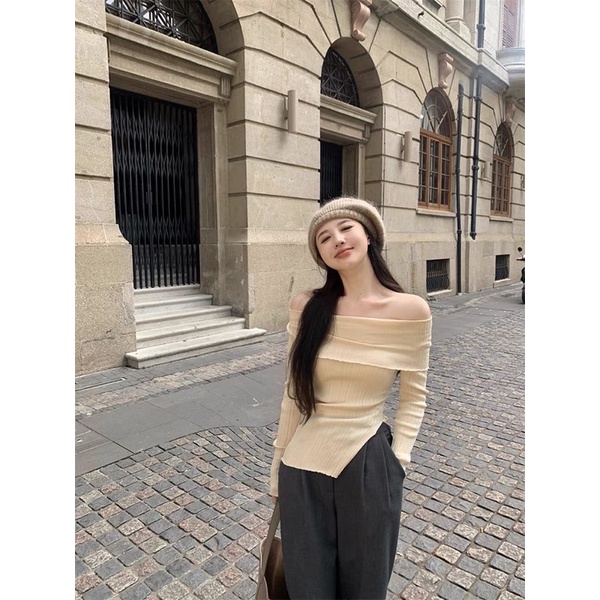 Áo len gân trễ vai sẻ eo