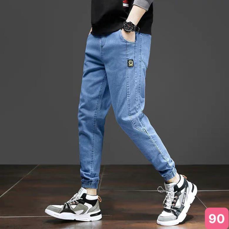 Quần jean jogger nam màu xanh nhạt trơn bo chân không rách chất bò cao cấp co dãn 4 chiều, rin lưng thun 90HDH *