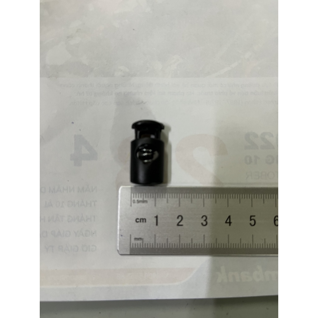 Nút chặn đầu dây rút lò xo bằng nhựa tròn màu đen tiện dụng