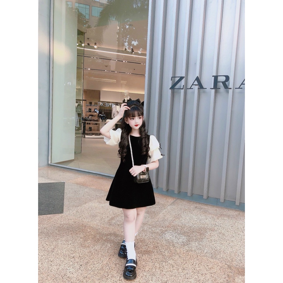 BÁN SỈ VÁY BÉ GÁI NHUNG ĐEN TAY BE ĐÍNH NƠ