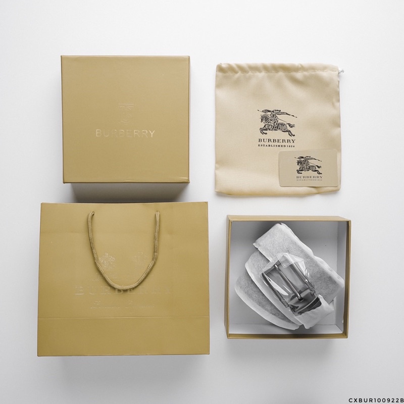 NỊT BURBERRY DƯ XỊN