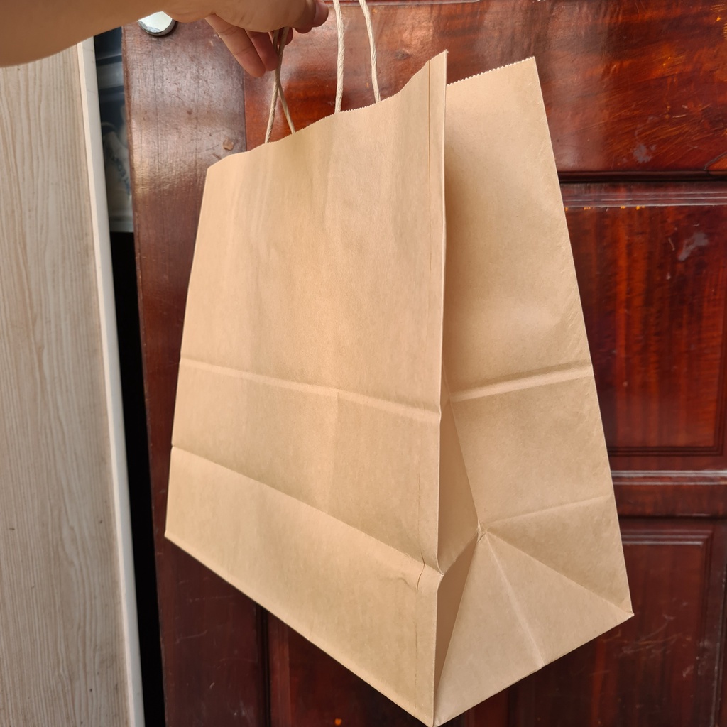 Thanh Lý - Túi giấy Kraft đã in logo 1 mặt, giấy dày, quai chắc chắn